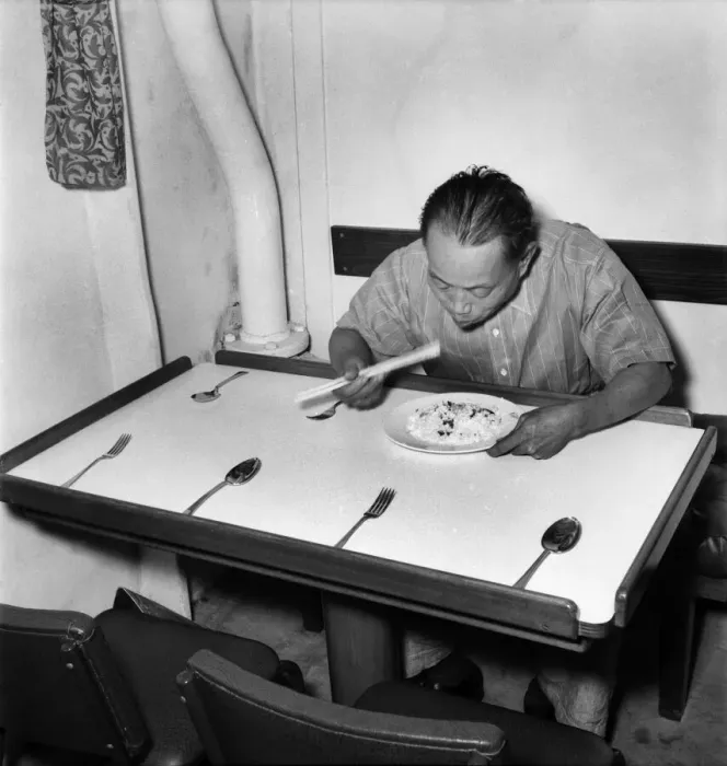 Framed Print : A Chinese member of the crew of the cargo vessel