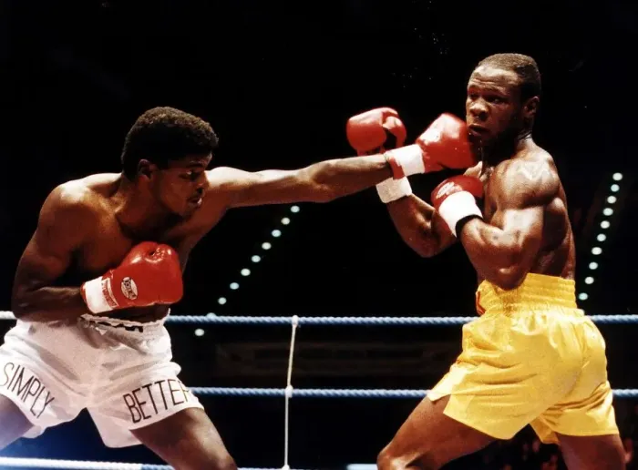 Framed Print : Chris Eubank Boxer takes a left jab from his opponent during their fight in Birmingham Framed Print : Chris Eubank Boxer takes a left jab from his opponent during their fight in Birmingham