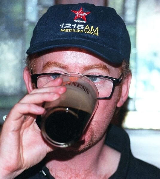 Chris Evans drinks a pint of Guinness in O Neill
