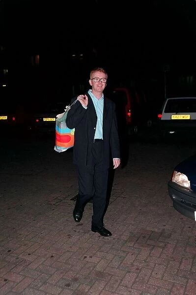Chris Evans Radio  /  TV Presenter June 1998 On a night out holding bag