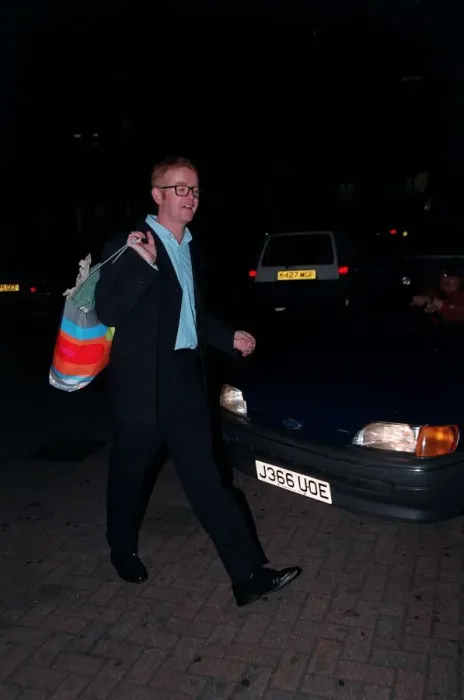 Framed Print : Chris Evans Radio / TV Presenter June 1998 On a night out holding bag Framed Print : Chris Evans Radio / TV Presenter June 1998 On a night out holding bag