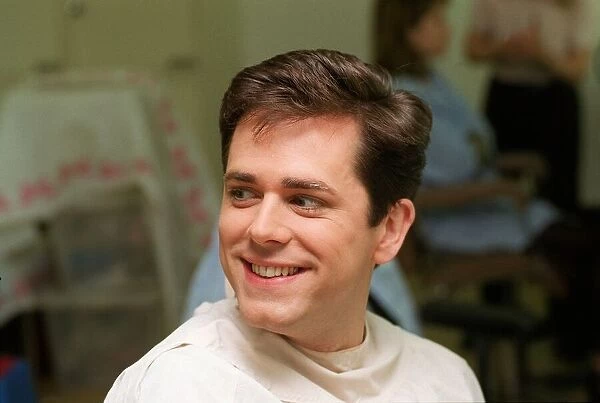 Chris Jarvis TV Presenter prepares for his make up session which will prematurely age him