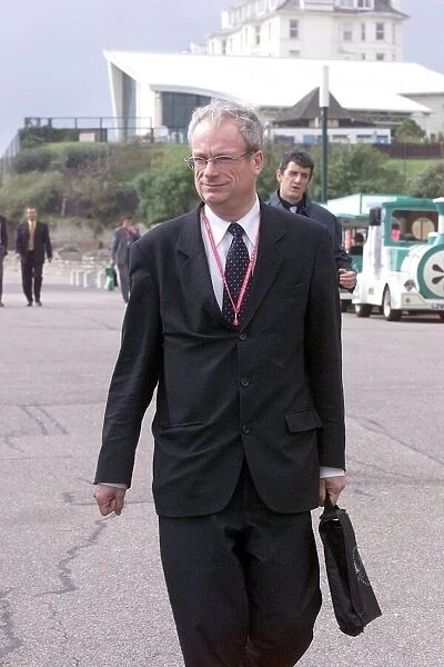 Chris Smith MP Cultural Secretary September 1999 walks from the hotel to