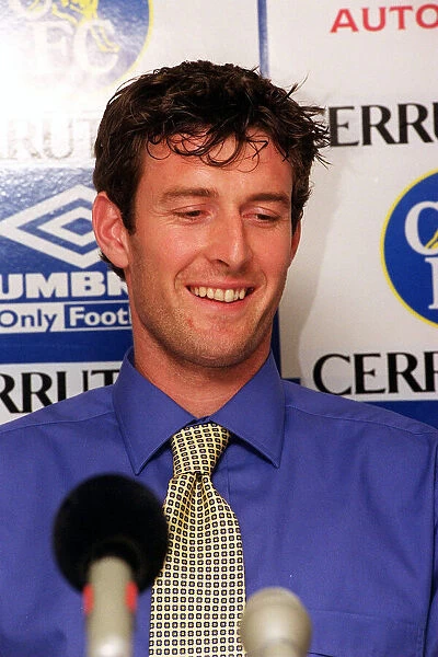 Chris Sutton, poses for the media during news press conference at Stamford Bridge after
