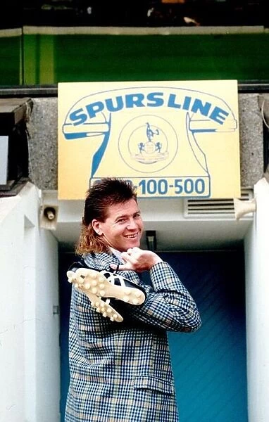 Chris Waddle about to go down Spurs Tunnel with boots hanging over his shoulder