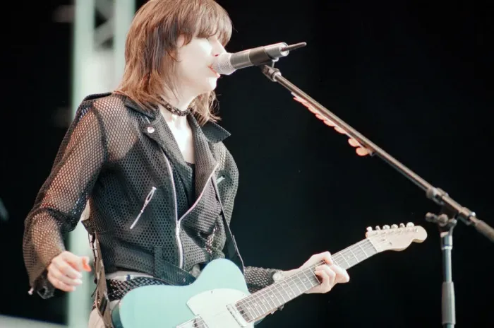 Framed Print : Chrissie Hynde (pictured) fronting her band The Pretenders