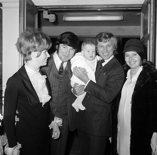 The Christening of six-month-old James Thomas Tarbuck, son of comedian Jimmy Tarbuck