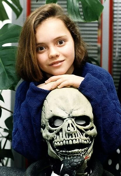 Christina Ricci actress child The Addams Family hands on skull