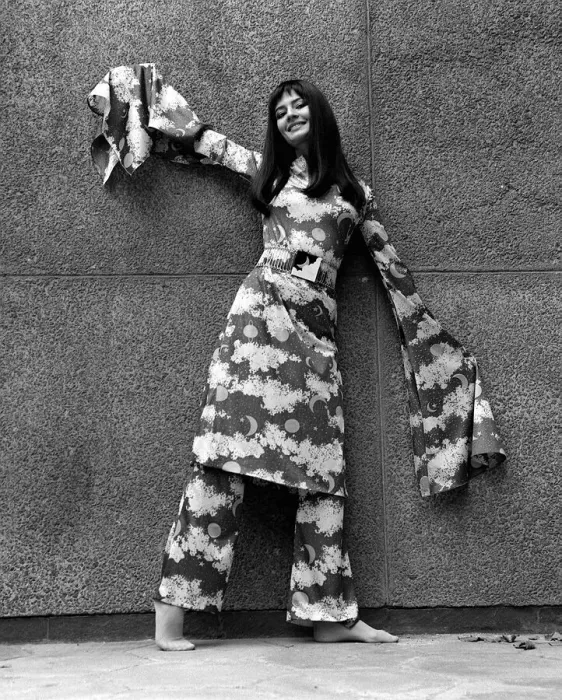 Framed Print : Christine Brooke in Simon Massey element print trouser outfit with outsize sleeves Framed Print : Christine Brooke in Simon Massey element print trouser outfit with outsize sleeves