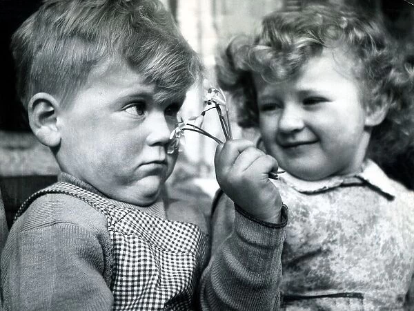 Christine Flynn flirting with a startled boyfriend. 1953