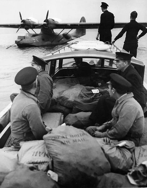 Christmas airmail being loaded on to a British Flying Boat on its way to British forces