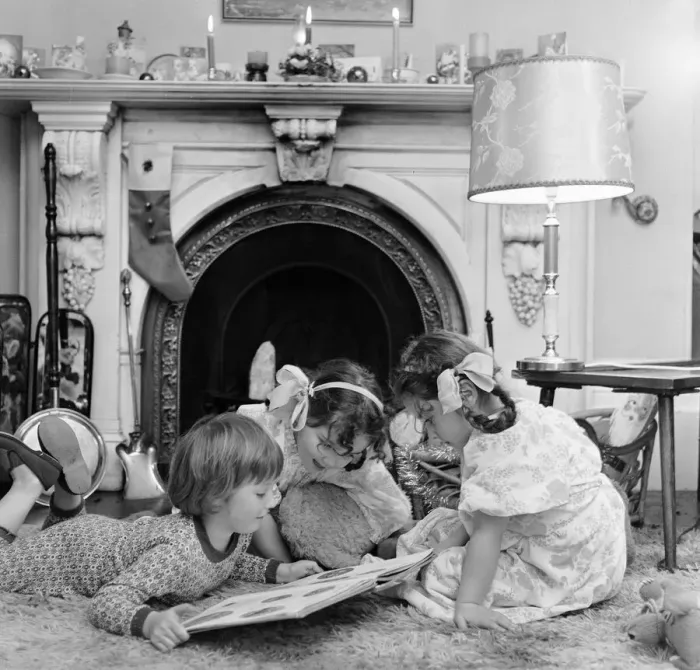 Framed Print : Christmas Eve, Children reading bedtime stories as they wait for Santa, Newcastle Framed Print : Christmas Eve, Children reading bedtime stories as they wait for Santa, Newcastle