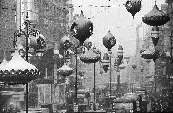 Christmas lights and decorations in Regent Street, London 1961 Local Caption