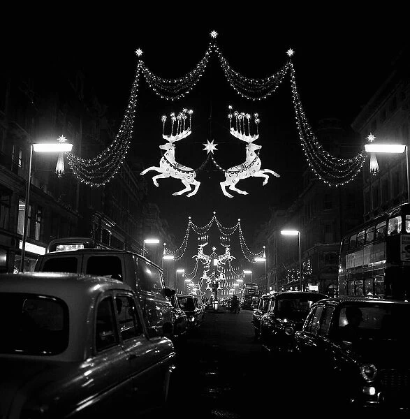 Christmas lights and decorations in Regent Street, London 1964 Local Caption