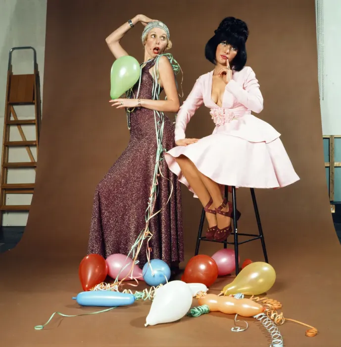 Framed Print : Christmas party fashions, modelled by Helen and Monique. Helen, left, wears £14 Framed Print : Christmas party fashions, modelled by Helen and Monique. Helen, left, wears £14