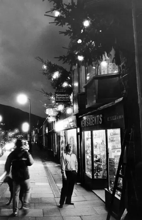 Framed Print : Christmas trees lend a festive air to Ton Pentres main street Framed Print : Christmas trees lend a festive air to Ton Pentres main street