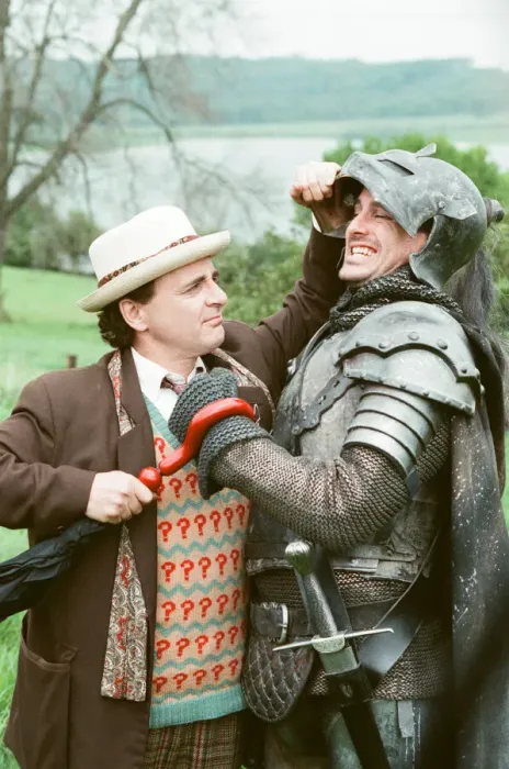 Framed Print : Christopher Bowen as Mordred crosses swords with Sylvester McCoy as the Doctor whilst Framed Print : Christopher Bowen as Mordred crosses swords with Sylvester McCoy as the Doctor whilst