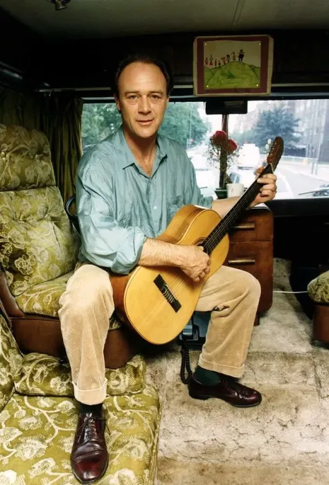 Framed Print : Christopher Cazenove actor sitting in his motor home playing guitar Framed Print : Christopher Cazenove actor sitting in his motor home playing guitar