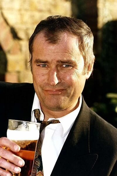Christopher Ellison actor - drinking a pint of beer