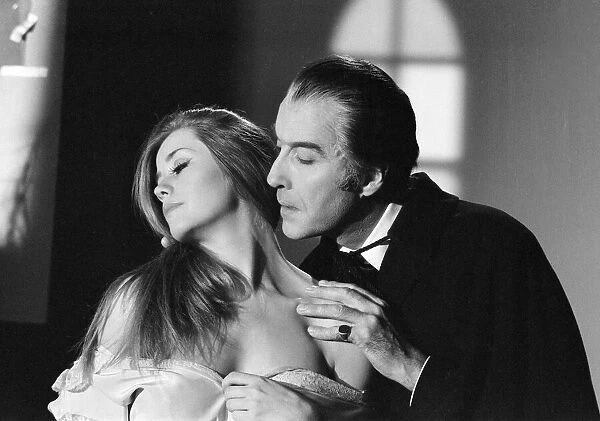Christopher Lee, being photographed for poster, dressed as character Dracula in film