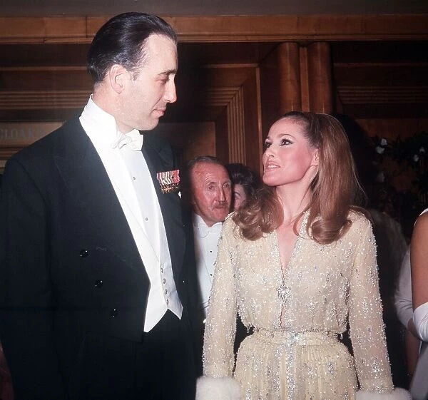 Christopher Lee & Ursula Andress pictured arriving at Royal premiere of film Born Free