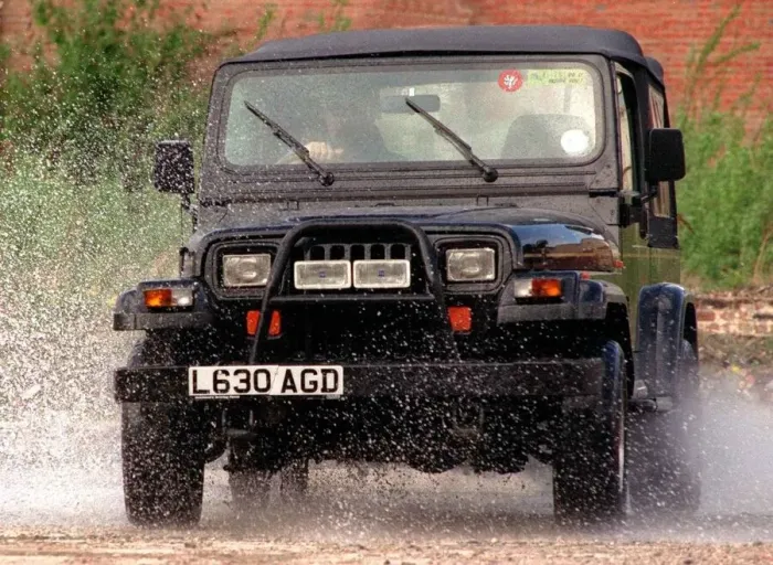 Framed Print : Chrysler Jeep Wrangler driven through puddles with bull bars fitted Framed Print : Chrysler Jeep Wrangler driven through puddles with bull bars fitted