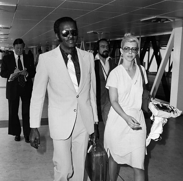 Chuck Berry, an American guitarist, singer and songwriter, at Heathrow Airport