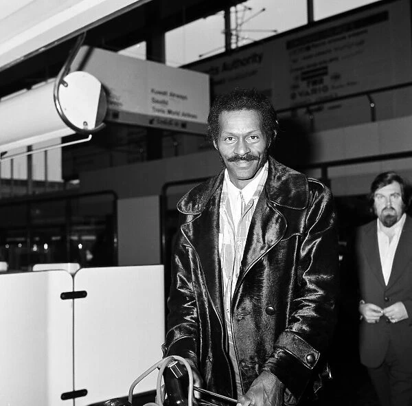 Chuck Berry arriving at Heathrow airport, London. 7th March 1975