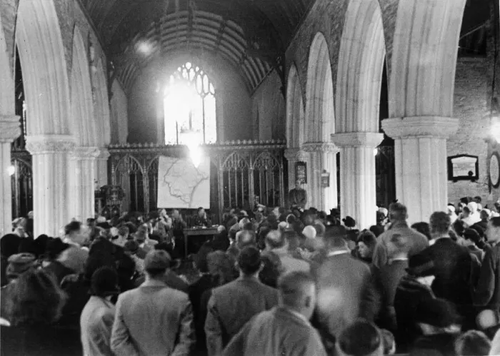 Framed Print : Church meeting before villagers evacuate to allow American army manouvres Framed Print : Church meeting before villagers evacuate to allow American army manouvres