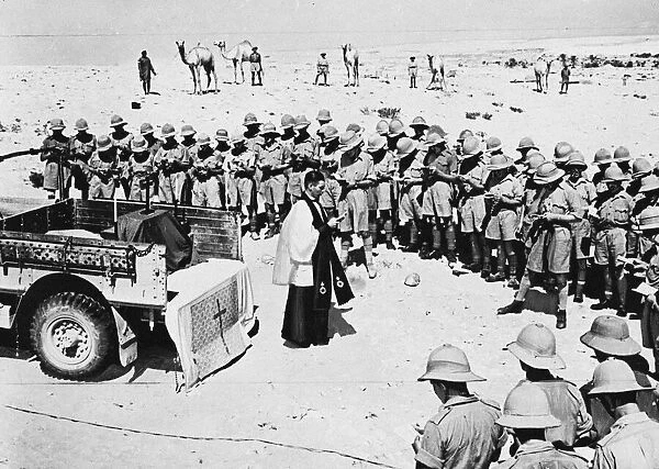 Church Parade in Desert. With an Army truck as an alter, and the sky as a dome