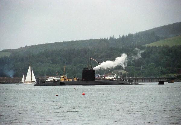 The Churchill class nuclear submarine HMS Conqueror leaves Her Majestys Naval Base