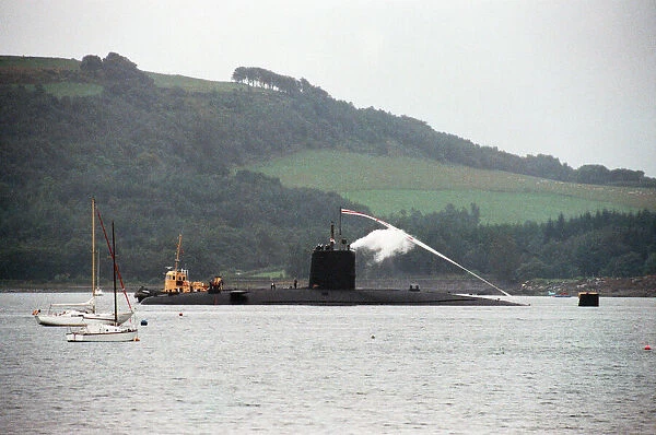The Churchill class nuclear submarine HMS Conqueror leaves Her Majestys Naval Base