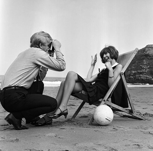 Cilla Black and her manager Bobby Willis on a beach on the Northumbrian coast