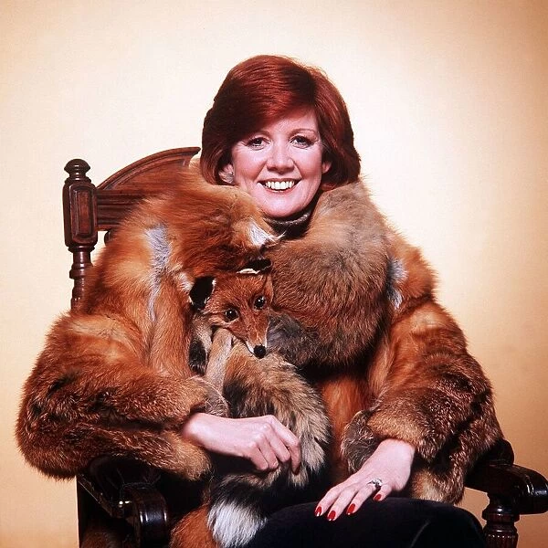 Cilla Black singer and entertainer wearing fox fur coat Circa 1985