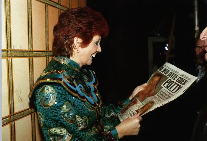 Framed Print : Cilla Black TV Personality reading Daily Mirror during Panto rehearsals at the Wimbledon Framed Print : Cilla Black TV Personality reading Daily Mirror during Panto rehearsals at the Wimbledon