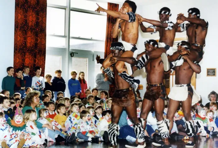 Framed Print : Circus visits Redcar, children dressed as clowns watching performers from a circus