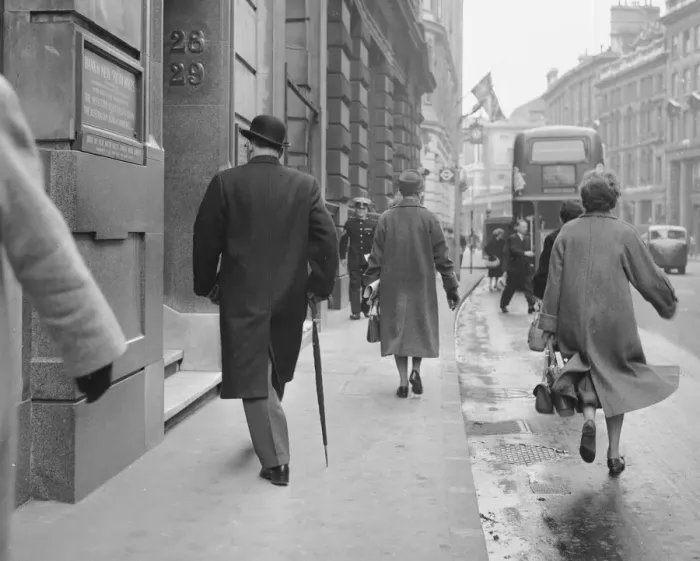 Framed Print : A city banker seen here arriving at his office at the Bank of New South Wales in the city Framed Print : A city banker seen here arriving at his office at the Bank of New South Wales in the city