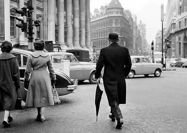 A city banker seen here making his way to the offices of the Bank of New South Wales in
