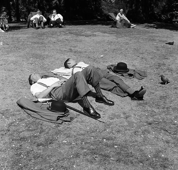 City gents sunbathing in London. 1st July 1957