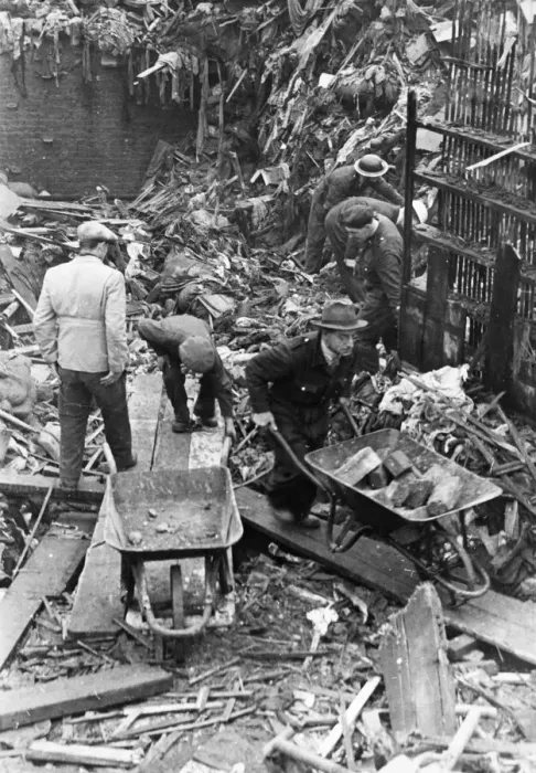 Framed Print : Civilians and firemen help to clear wreckage after another World War Two air raid over Framed Print : Civilians and firemen help to clear wreckage after another World War Two air raid over