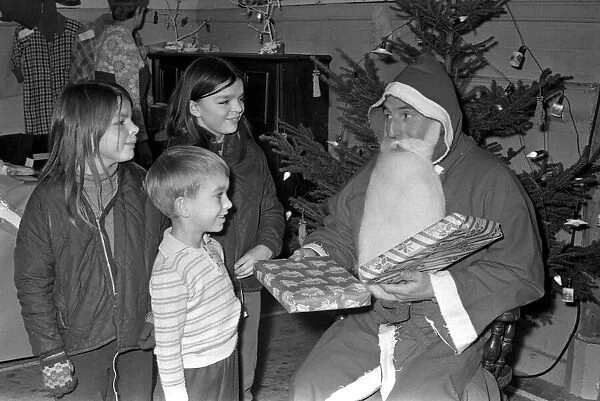 Claybrooke christmas fayre at the village hall. Shirley & Joy Rathbone with Santa