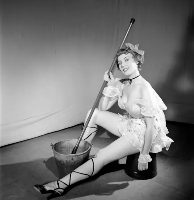 Framed Print : Cleaner wearing fancy dress. 1966 E25-004