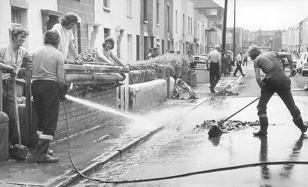 Cleaning up after floods in Lypiatt Road, St George, Bristol in 1974