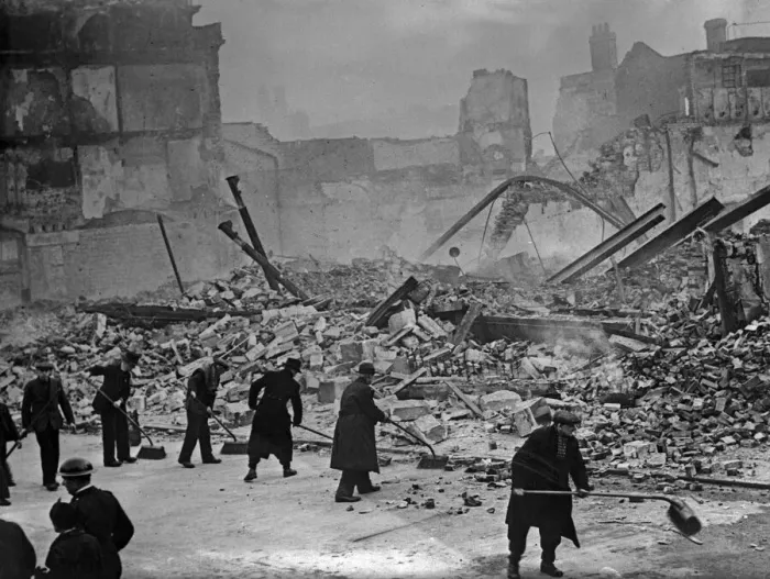 Framed Print : Clearing the debris of Barton Warehouse, Stokes Croft, Bristol following the first heavy