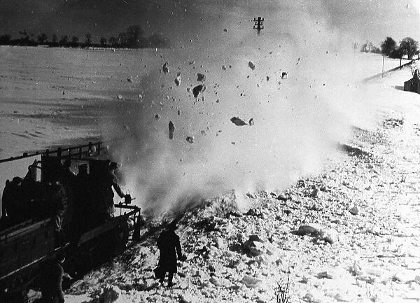 Clearing snow off railway lines at Hartington, Derbyshire Peak District, England