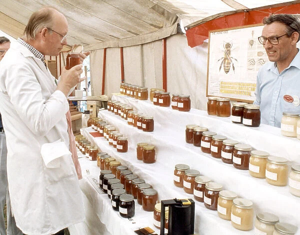 Cleveland Agricultural Show, Mike Badger checks the honey. 28th July 1990