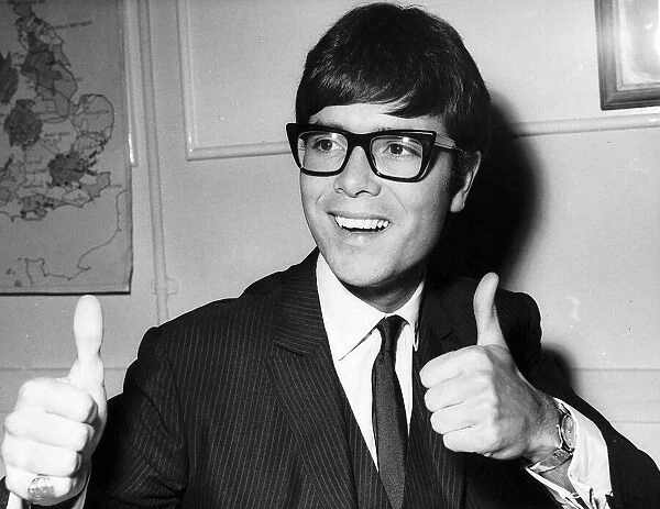 Cliff Richard Actor  /  Singer giving the thumbs up sign 3rd October 1967