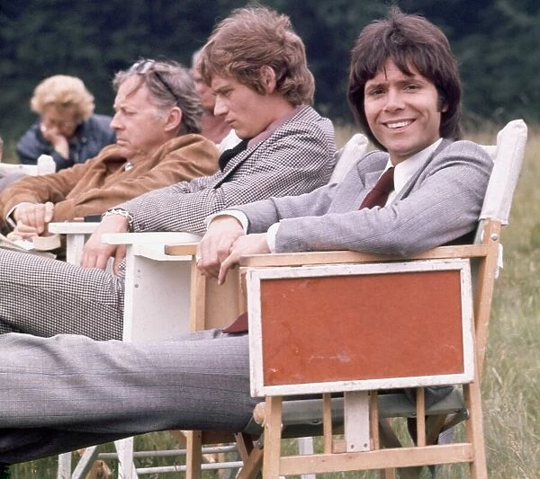 Cliff Richard and Anthony Andrews seen here relaxing between takes on location filming