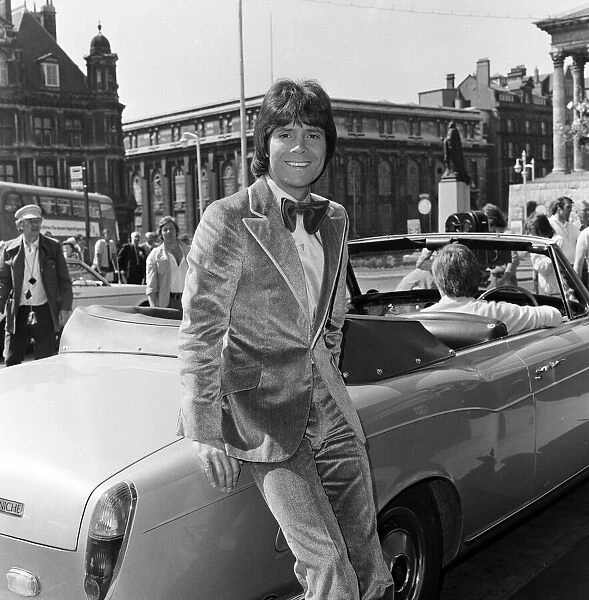 Cliff Richard leaving a Birmingham hotel for location work on his latest film