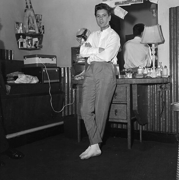 Cliff Richard pictured in his dressing room at the Palladium. 26th September 1960